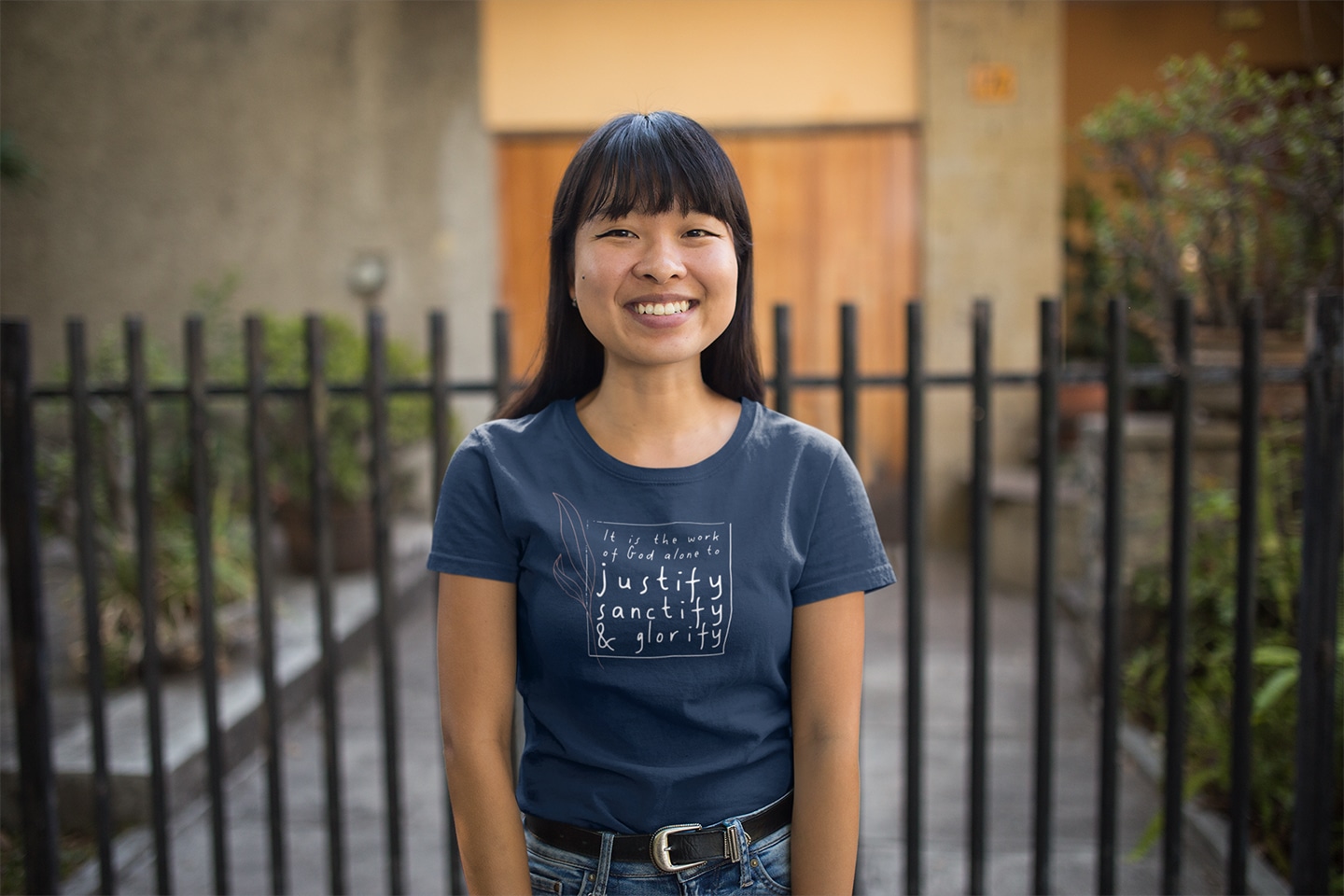 tshirt-mockup-featuring-a-happy-woman-outside-her-house-20645 copy